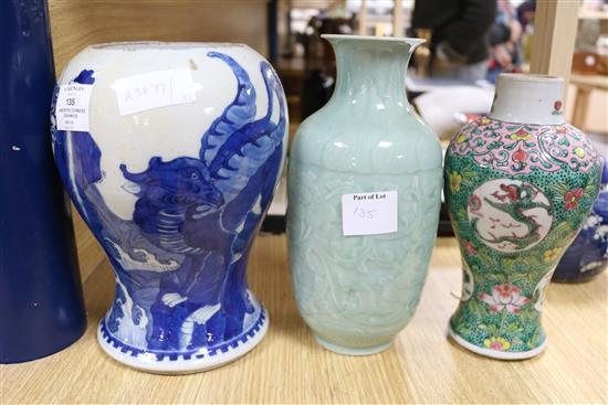 A Chinese blue and white dragon vase, a figure, two jars, teabowl and a famille verte vase